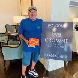The essence of exceptional living man standing by a sign