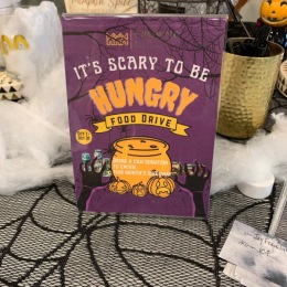 The essence of exceptional living purple halloween bag